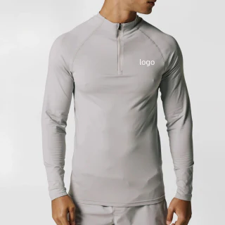 T-shirt à manches longues en polyester/élasthanne pour hommes avec zip quart de longueur · 1