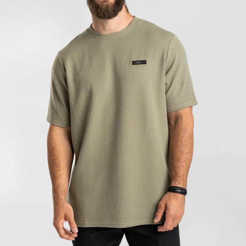 Camiseta de hombre en punto gofrado de algodón/poliéster · 1