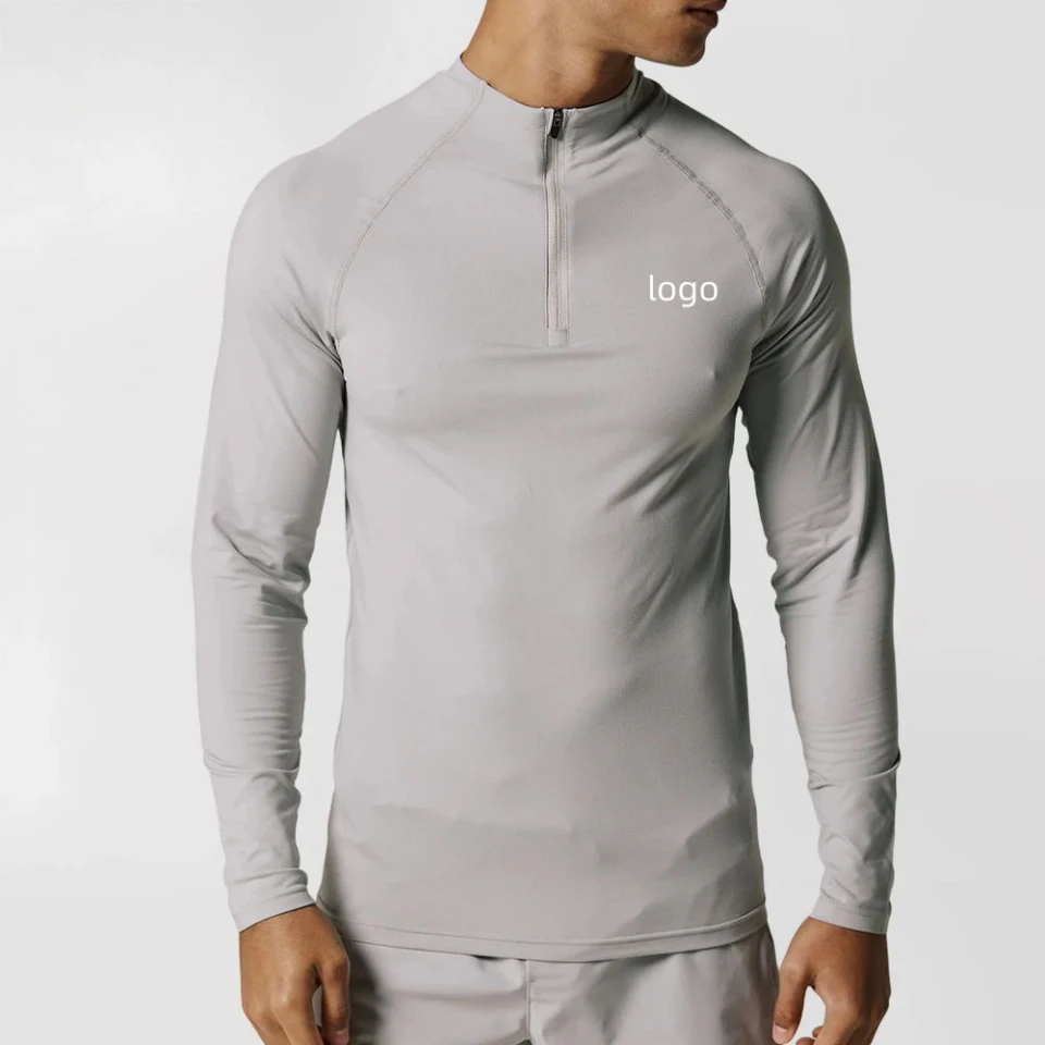 T-shirt à manches longues en polyester/élasthanne pour hommes avec zip quart de longueur · 1